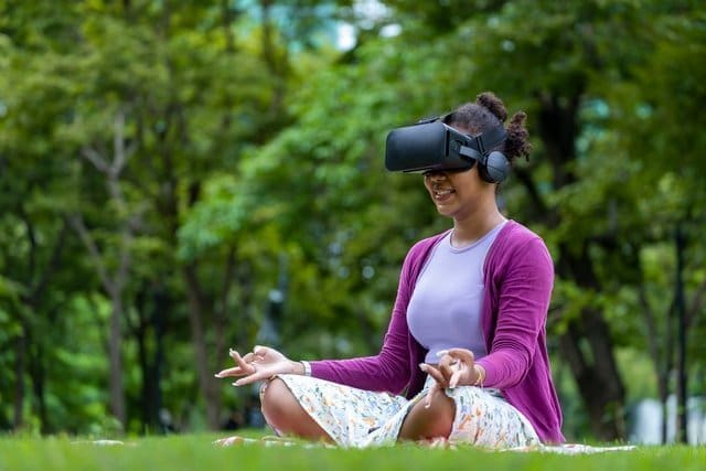 African American woman relaxingly practicing meditation in the f
